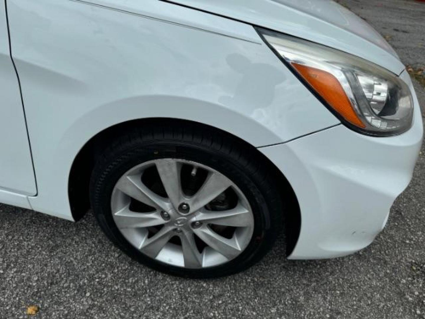 2014 White Hyundai Accent SE 5-Door (KMHCU5AE2EU) with an 1.6L L4 DOHC 16V engine, located at 1806 Veterans Memorial Hwy SW, Austell, GA, 30168, (770) 944-9558, 33.817959, -84.606987 - Photo#19