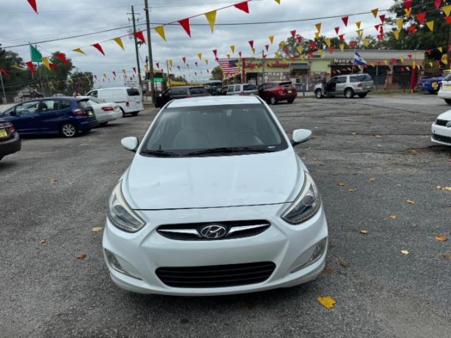 2014 White Hyundai Accent SE 5-Door (KMHCU5AE2EU) with an 1.6L L4 DOHC 16V engine, located at 1806 Veterans Memorial Hwy SW, Austell, GA, 30168, (770) 944-9558, 33.817959, -84.606987 - Photo#1