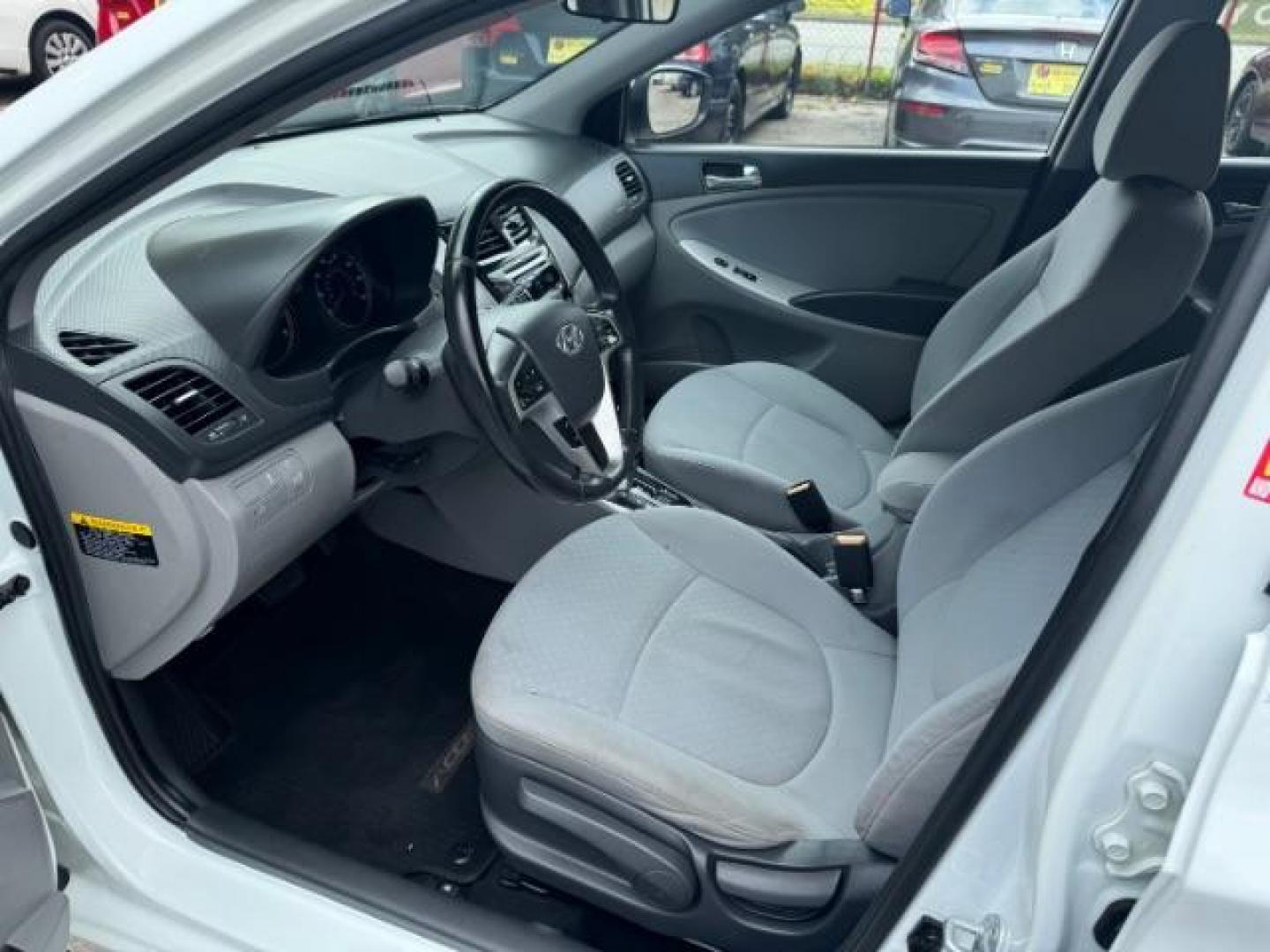 2014 White Hyundai Accent SE 5-Door (KMHCU5AE2EU) with an 1.6L L4 DOHC 16V engine, located at 1806 Veterans Memorial Hwy SW, Austell, GA, 30168, (770) 944-9558, 33.817959, -84.606987 - Photo#6