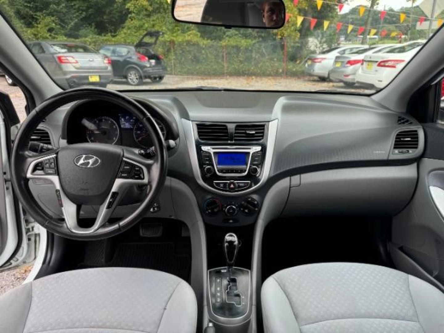 2014 White Hyundai Accent SE 5-Door (KMHCU5AE2EU) with an 1.6L L4 DOHC 16V engine, located at 1806 Veterans Memorial Hwy SW, Austell, GA, 30168, (770) 944-9558, 33.817959, -84.606987 - Photo#11