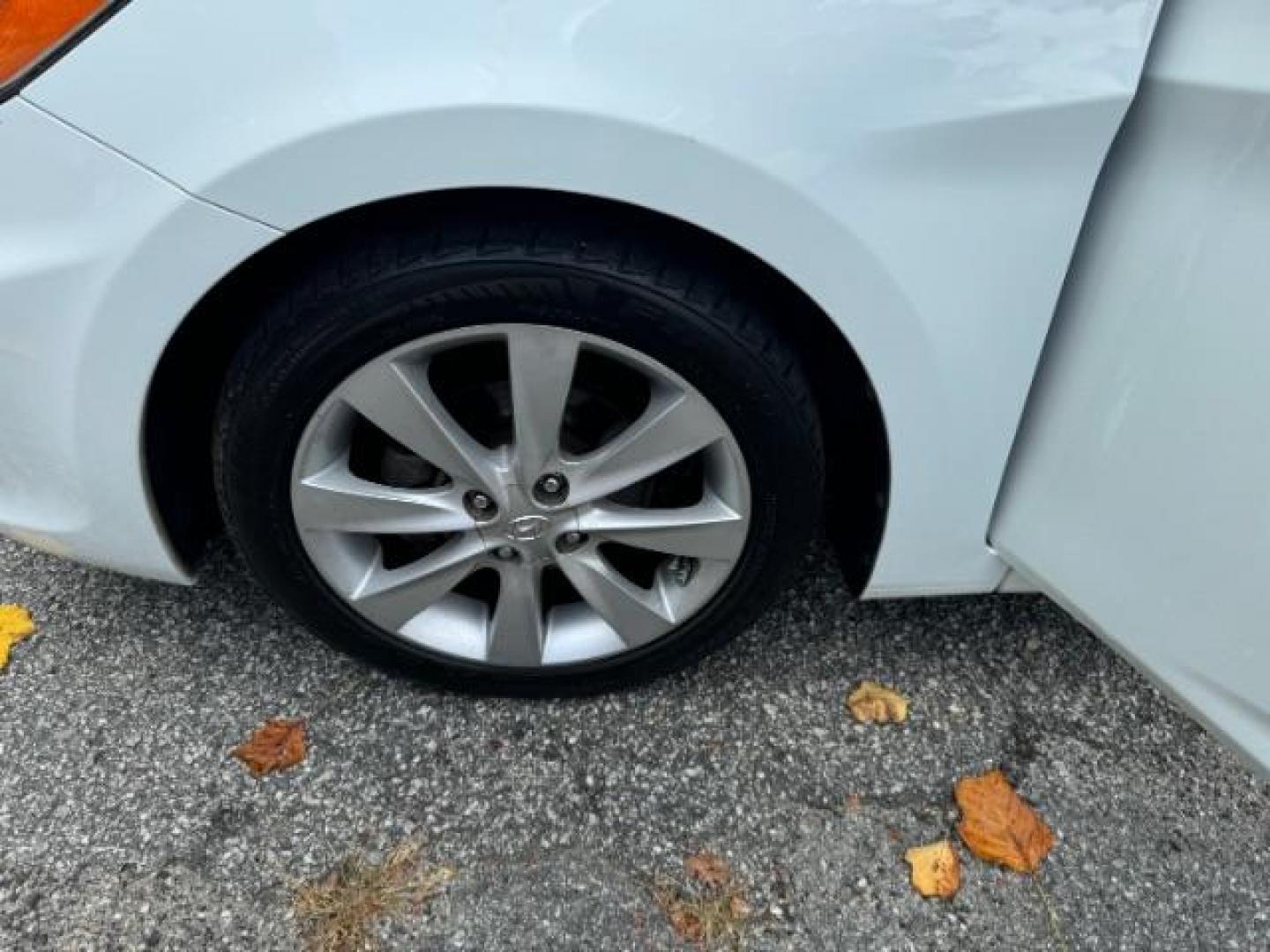 2014 White Hyundai Accent SE 5-Door (KMHCU5AE2EU) with an 1.6L L4 DOHC 16V engine, located at 1806 Veterans Memorial Hwy SW, Austell, GA, 30168, (770) 944-9558, 33.817959, -84.606987 - Photo#18