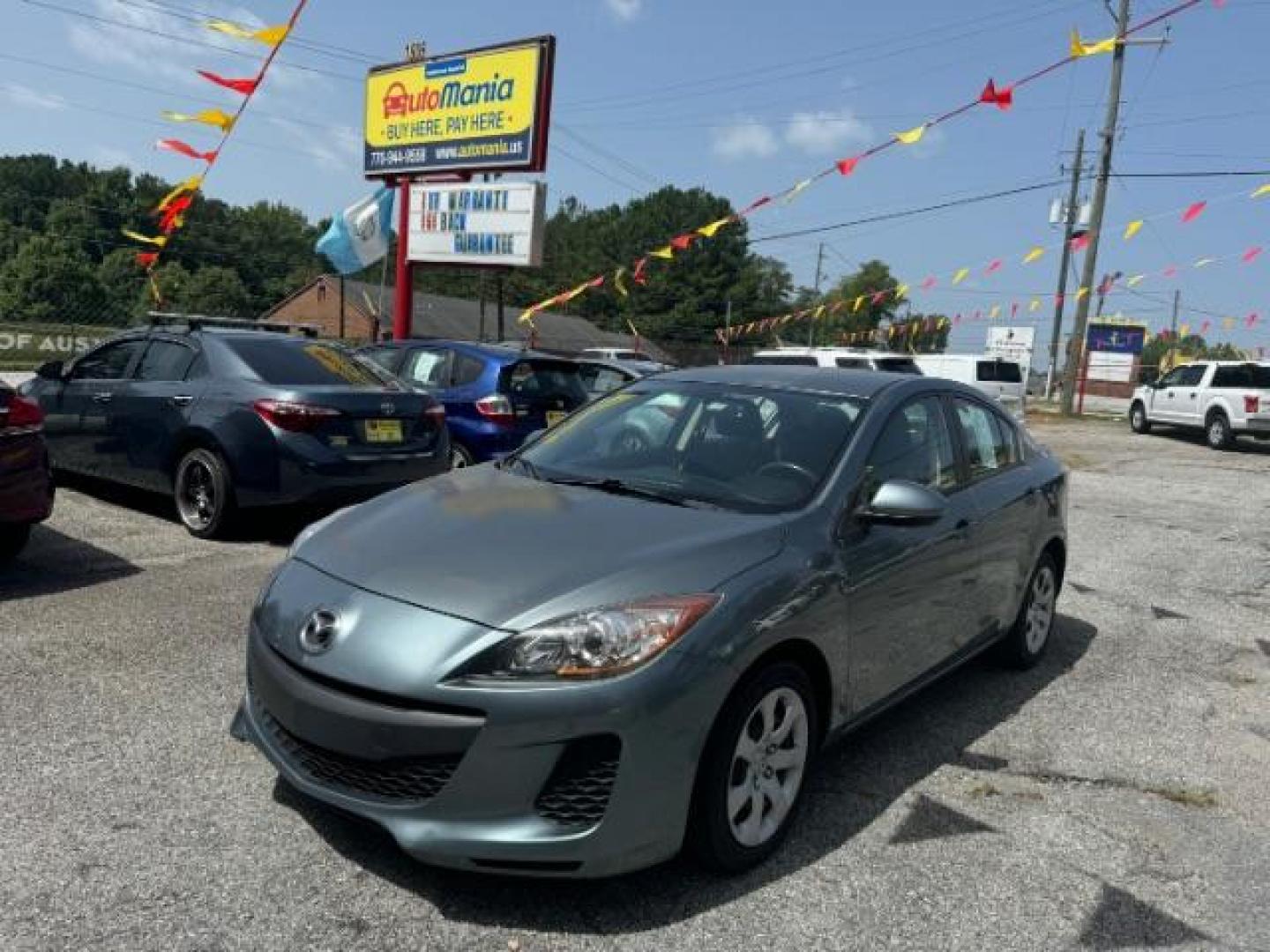 2013 Gray Mazda MAZDA3 i SV AT 4-Door (JM1BL1TF5D1) with an 2.0L L4 DOHC 16V engine, 5-Speed Automatic transmission, located at 1806 Veterans Memorial Hwy SW, Austell, GA, 30168, (770) 944-9558, 33.817959, -84.606987 - Photo#0