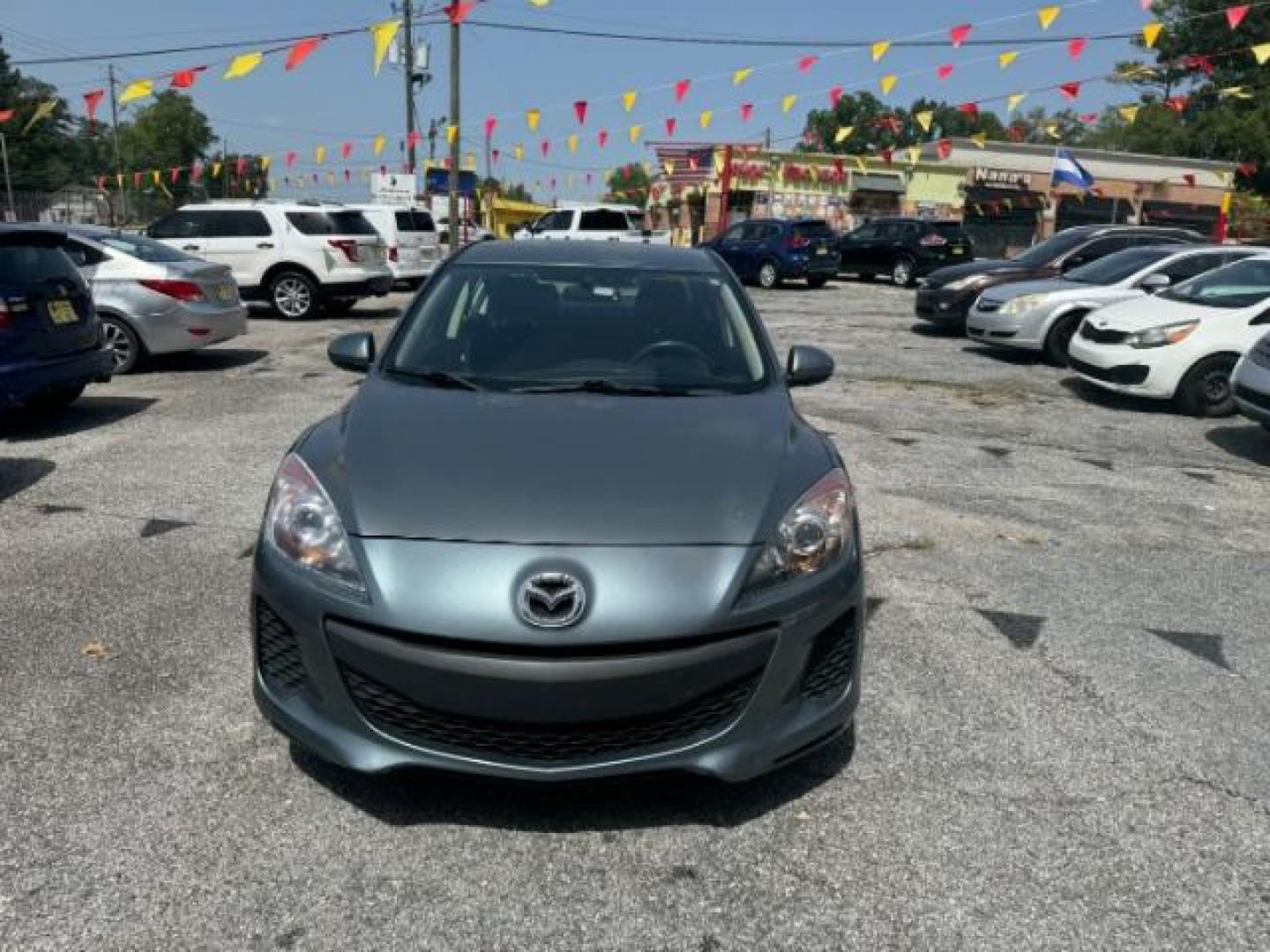 2013 Gray Mazda MAZDA3 i SV AT 4-Door (JM1BL1TF5D1) with an 2.0L L4 DOHC 16V engine, 5-Speed Automatic transmission, located at 1806 Veterans Memorial Hwy SW, Austell, GA, 30168, (770) 944-9558, 33.817959, -84.606987 - Photo#1