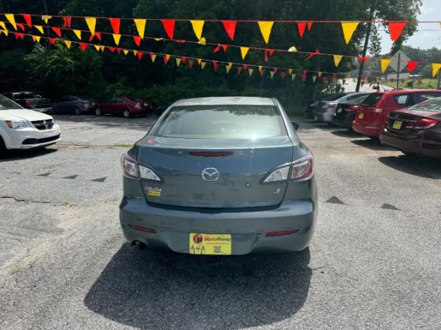 2013 Gray Mazda MAZDA3 i SV AT 4-Door (JM1BL1TF5D1) with an 2.0L L4 DOHC 16V engine, 5-Speed Automatic transmission, located at 1806 Veterans Memorial Hwy SW, Austell, GA, 30168, (770) 944-9558, 33.817959, -84.606987 - Photo#4