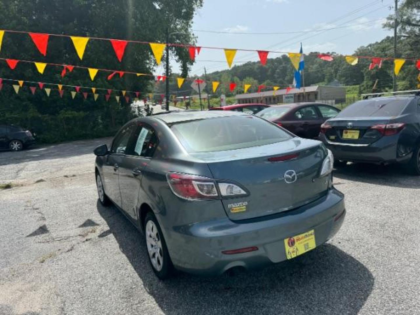 2013 Gray Mazda MAZDA3 i SV AT 4-Door (JM1BL1TF5D1) with an 2.0L L4 DOHC 16V engine, 5-Speed Automatic transmission, located at 1806 Veterans Memorial Hwy SW, Austell, GA, 30168, (770) 944-9558, 33.817959, -84.606987 - Photo#5