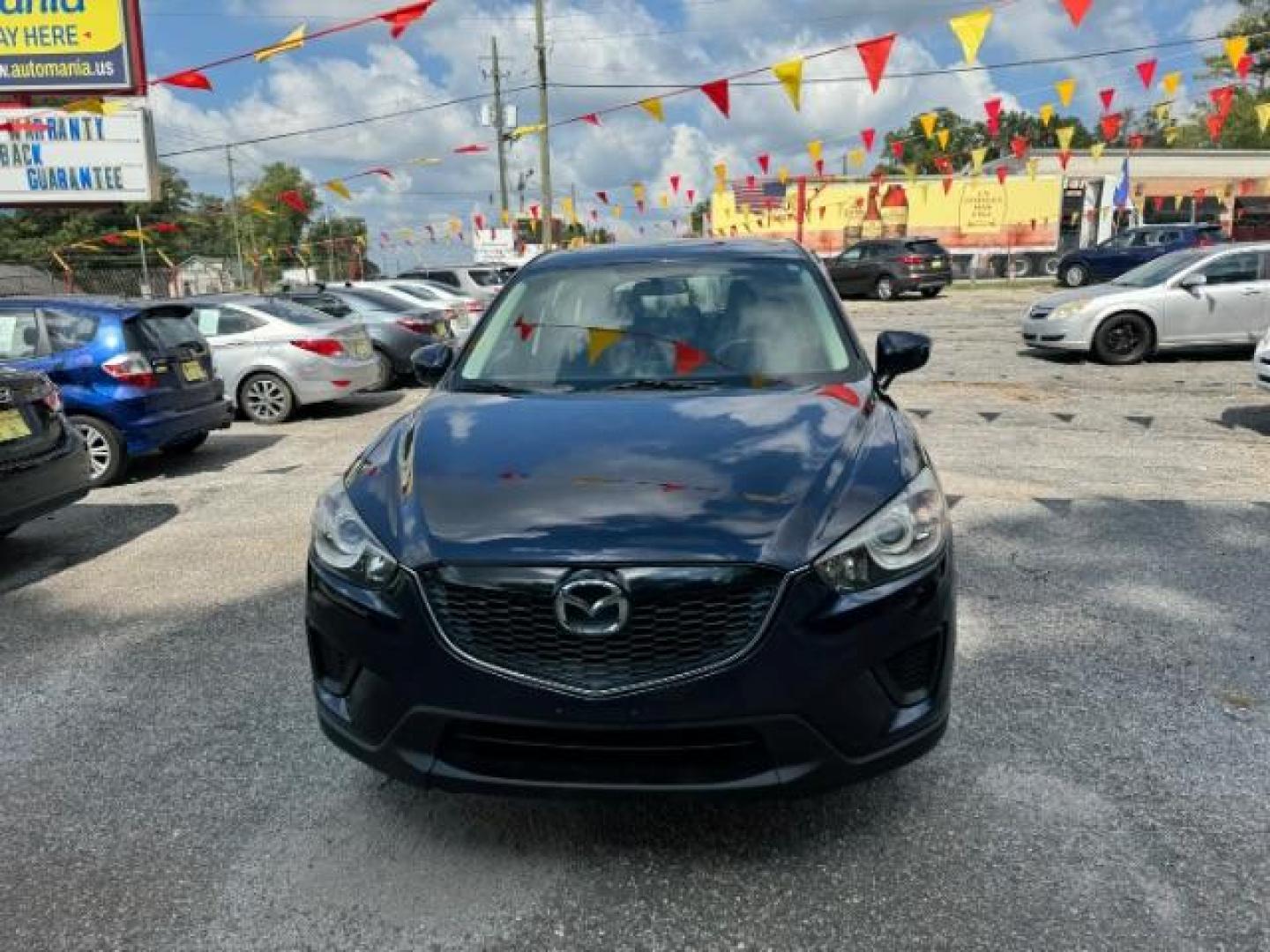 2015 Blue Mazda CX-5 Sport AT (JM3KE2BE4F0) with an 2.0L L4 DOHC 16V engine, 6-Speed Automatic transmission, located at 1806 Veterans Memorial Hwy SW, Austell, GA, 30168, (770) 944-9558, 33.817959, -84.606987 - Photo#1