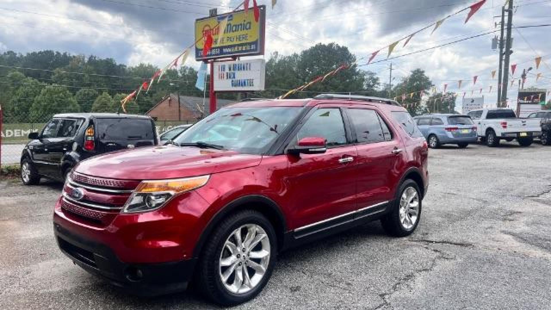 2015 Red Ford Explorer Limited FWD (1FM5K7F84FG) with an 3.5L V6 DOHC 24V engine, 6-Speed Automatic transmission, located at 1806 Veterans Memorial Hwy SW, Austell, GA, 30168, (770) 944-9558, 33.817959, -84.606987 - Photo#0