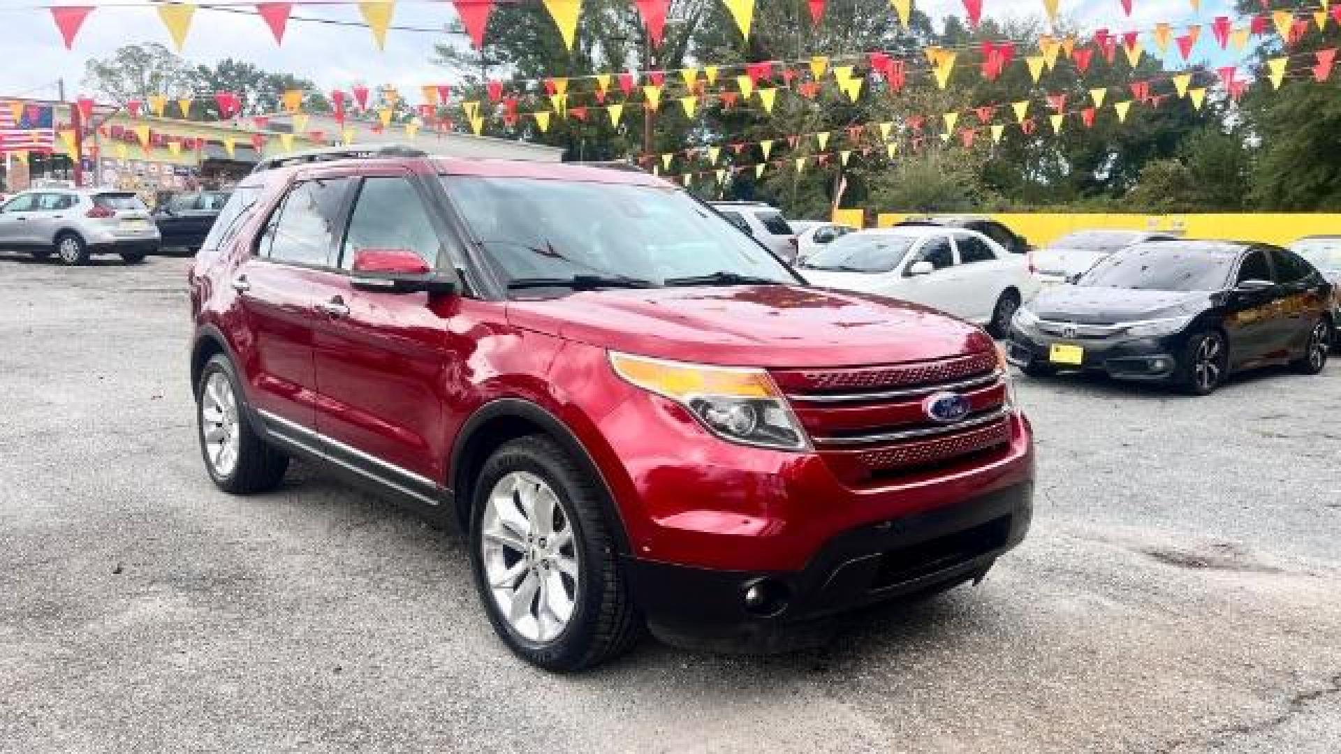 2015 Red Ford Explorer Limited FWD (1FM5K7F84FG) with an 3.5L V6 DOHC 24V engine, 6-Speed Automatic transmission, located at 1806 Veterans Memorial Hwy SW, Austell, GA, 30168, (770) 944-9558, 33.817959, -84.606987 - Photo#2