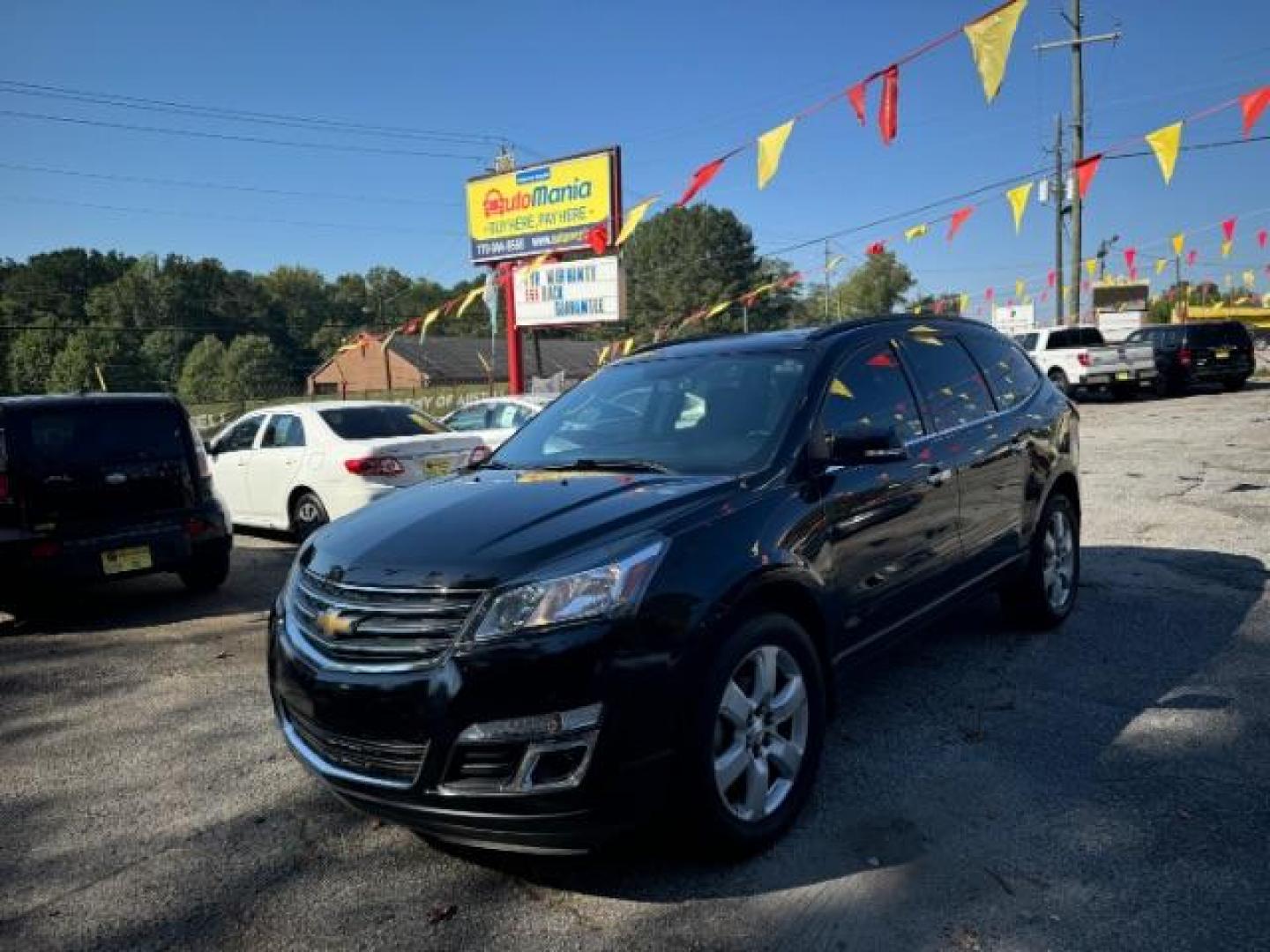 2016 Black Chevrolet Traverse 1LT FWD (1GNKRGKD0GJ) with an 3.6L V6 DOHC 24V engine, 6-Speed Automatic transmission, located at 1806 Veterans Memorial Hwy SW, Austell, GA, 30168, (770) 944-9558, 33.817959, -84.606987 - Photo#0