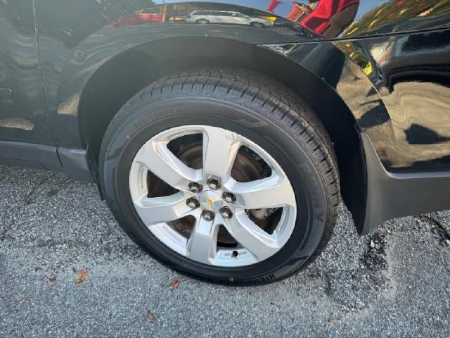 2016 Black Chevrolet Traverse 1LT FWD (1GNKRGKD0GJ) with an 3.6L V6 DOHC 24V engine, 6-Speed Automatic transmission, located at 1806 Veterans Memorial Hwy SW, Austell, GA, 30168, (770) 944-9558, 33.817959, -84.606987 - Photo#22