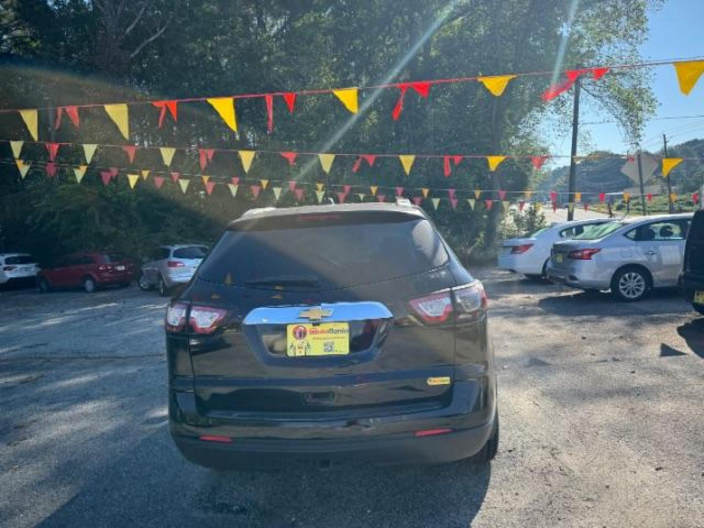 2016 Black Chevrolet Traverse 1LT FWD (1GNKRGKD0GJ) with an 3.6L V6 DOHC 24V engine, 6-Speed Automatic transmission, located at 1806 Veterans Memorial Hwy SW, Austell, GA, 30168, (770) 944-9558, 33.817959, -84.606987 - Photo#4