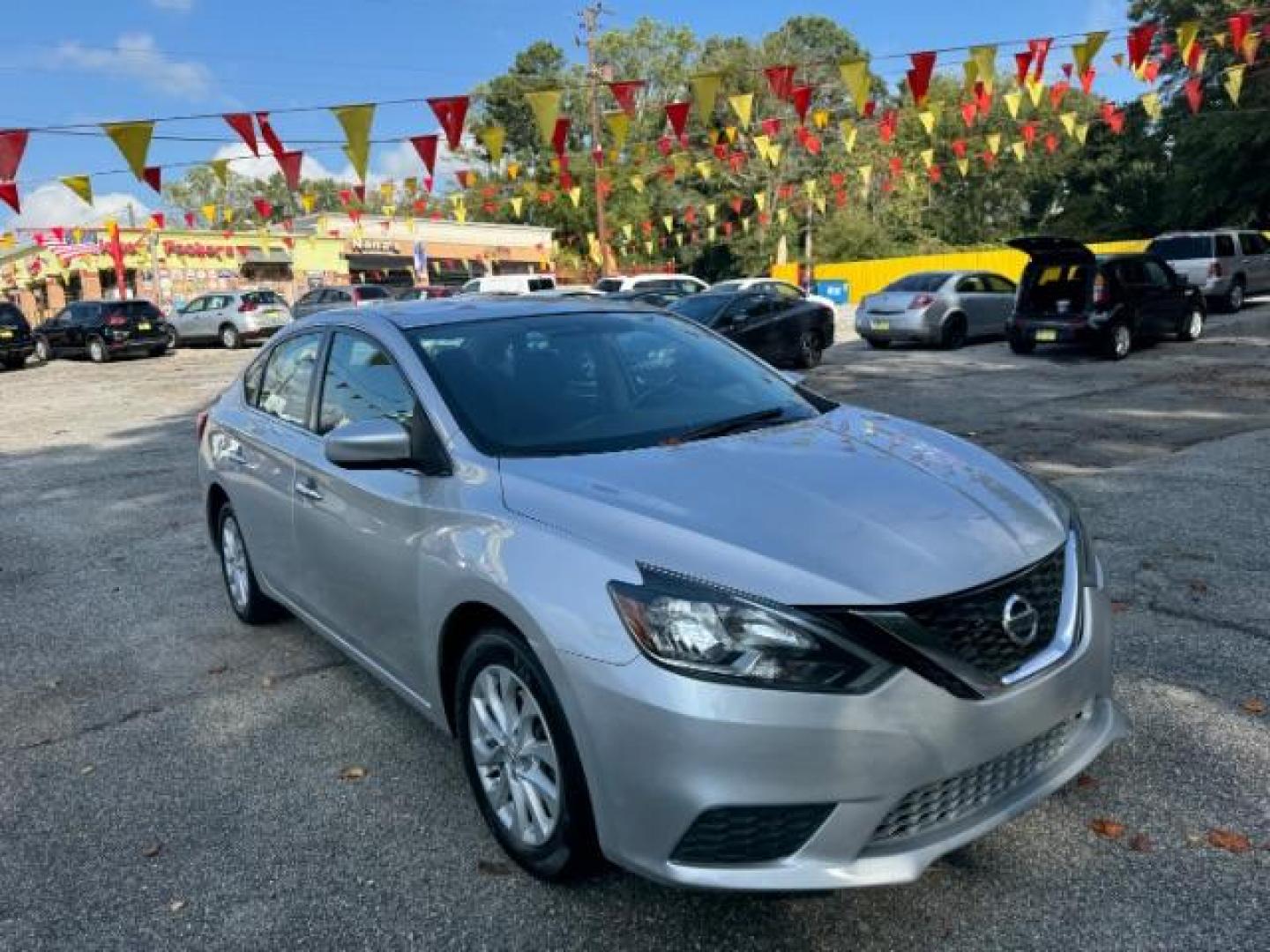 2019 Silver Nissan Sentra SV (3N1AB7AP7KY) with an 1.8L L4 SFI DOHC 16V engine, Continuously Variable Transmission transmission, located at 1806 Veterans Memorial Hwy SW, Austell, GA, 30168, (770) 944-9558, 33.817959, -84.606987 - Photo#1