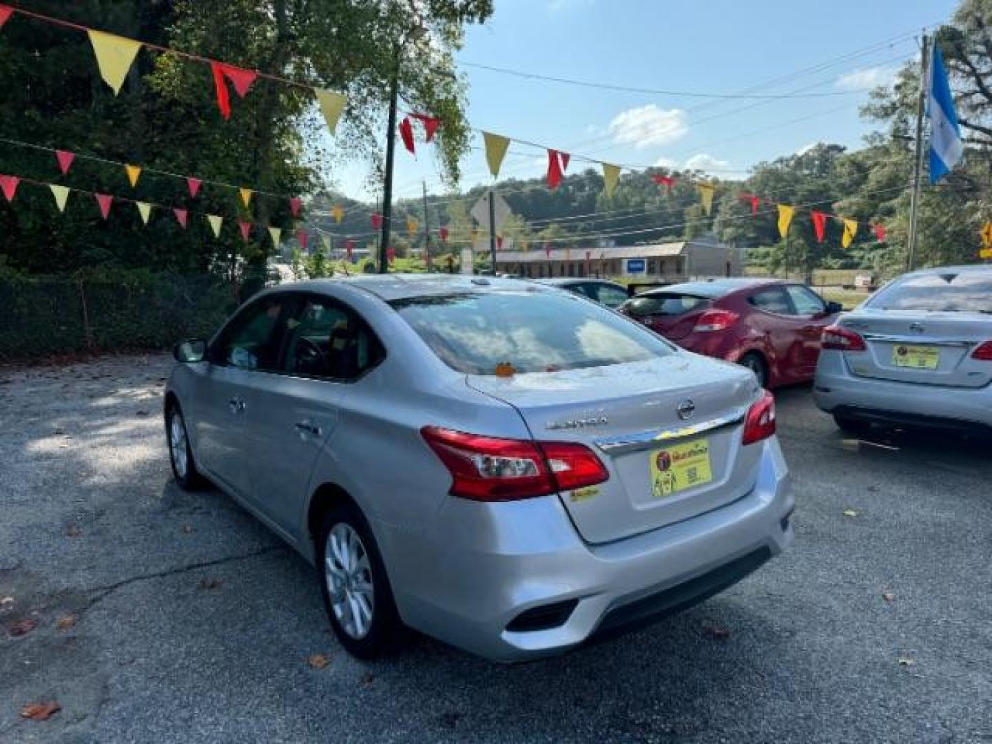 2019 Silver Nissan Sentra SV (3N1AB7AP7KY) with an 1.8L L4 SFI DOHC 16V engine, Continuously Variable Transmission transmission, located at 1806 Veterans Memorial Hwy SW, Austell, GA, 30168, (770) 944-9558, 33.817959, -84.606987 - Photo#5