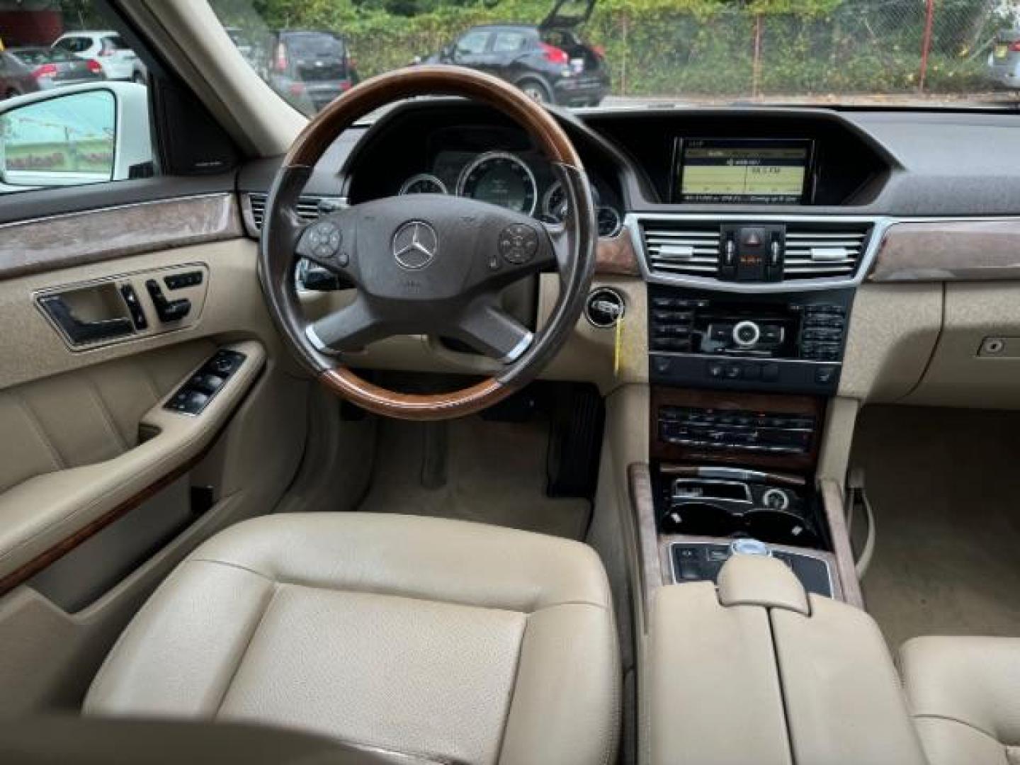 2011 White Mercedes-Benz E-Class E350 Sedan 4MATIC (WDDHF8HB0BA) with an 3.5L V6 DOHC 24V engine, 7-Speed Automatic transmission, located at 1806 Veterans Memorial Hwy SW, Austell, GA, 30168, (770) 944-9558, 33.817959, -84.606987 - Photo#12