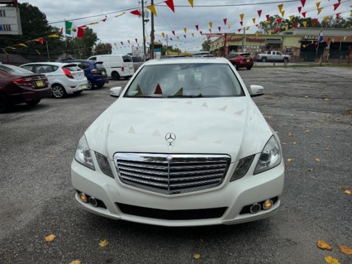 2011 White Mercedes-Benz E-Class E350 Sedan 4MATIC (WDDHF8HB0BA) with an 3.5L V6 DOHC 24V engine, 7-Speed Automatic transmission, located at 1806 Veterans Memorial Hwy SW, Austell, GA, 30168, (770) 944-9558, 33.817959, -84.606987 - Photo#0