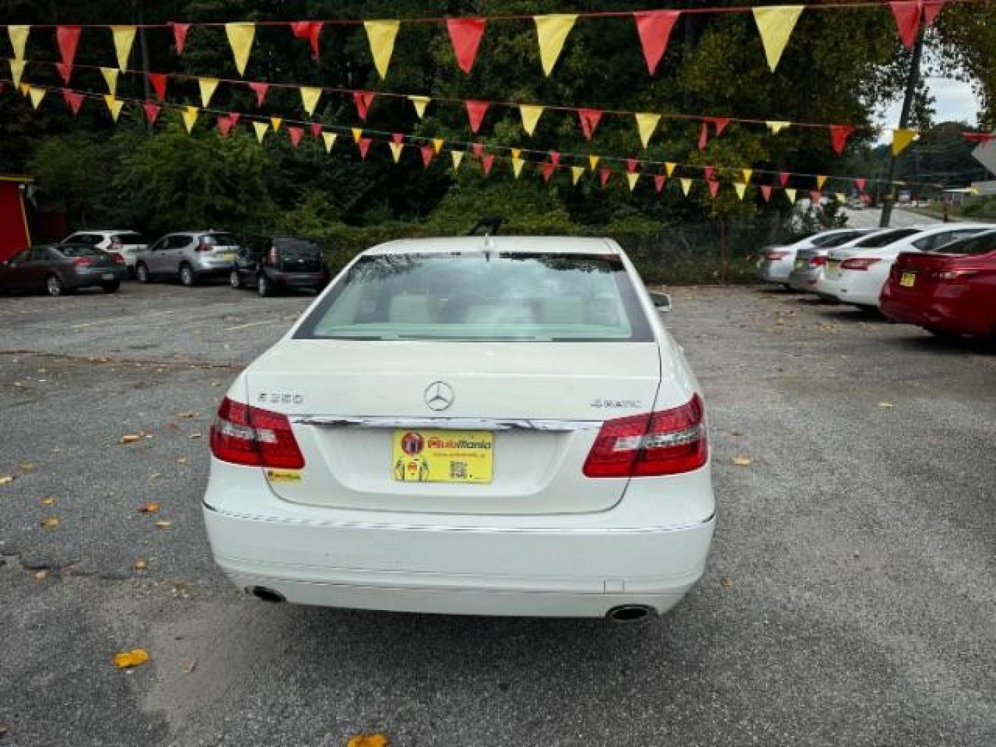 2011 White Mercedes-Benz E-Class E350 Sedan 4MATIC (WDDHF8HB0BA) with an 3.5L V6 DOHC 24V engine, 7-Speed Automatic transmission, located at 1806 Veterans Memorial Hwy SW, Austell, GA, 30168, (770) 944-9558, 33.817959, -84.606987 - Photo#4