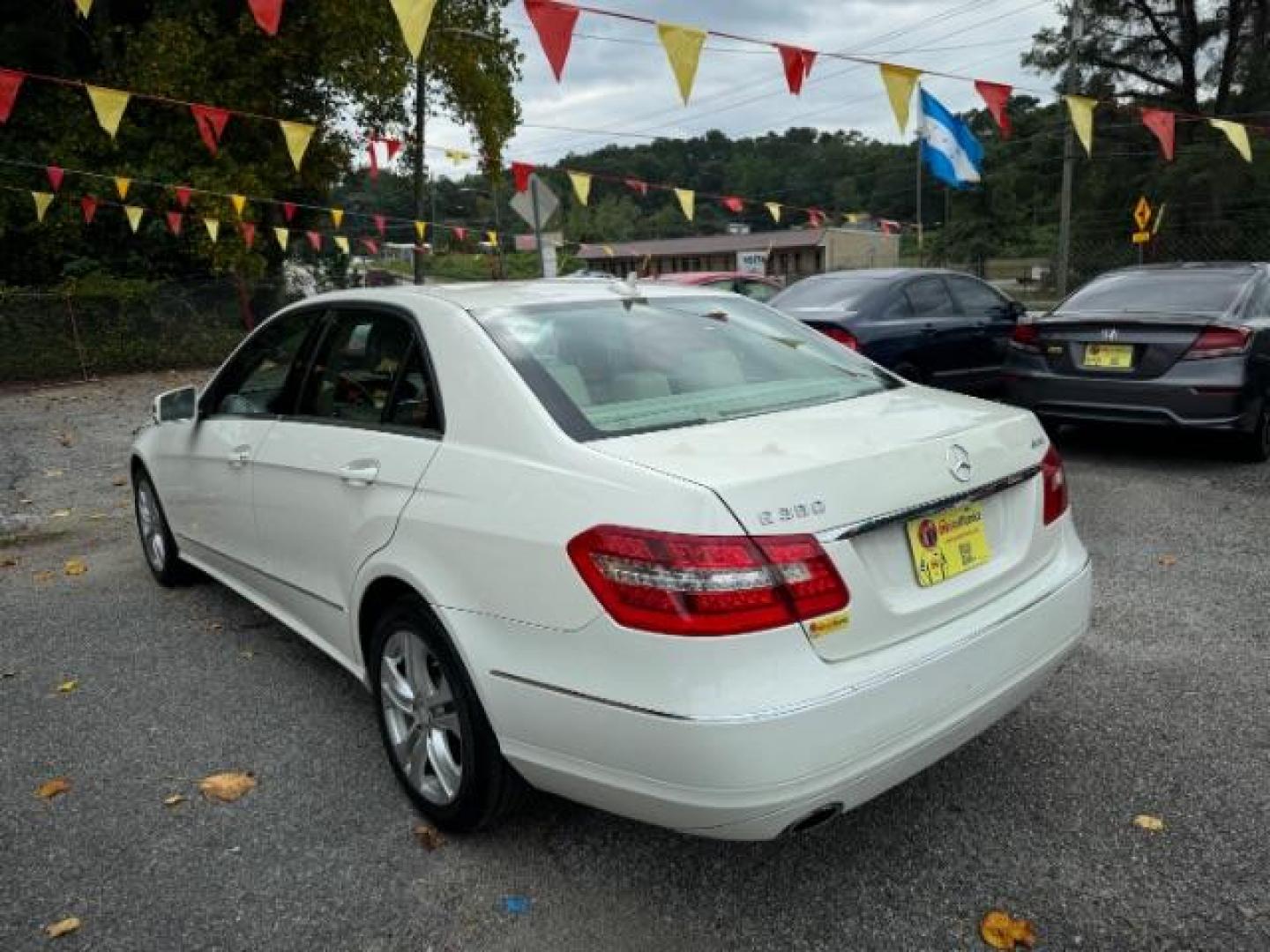 2011 White Mercedes-Benz E-Class E350 Sedan 4MATIC (WDDHF8HB0BA) with an 3.5L V6 DOHC 24V engine, 7-Speed Automatic transmission, located at 1806 Veterans Memorial Hwy SW, Austell, GA, 30168, (770) 944-9558, 33.817959, -84.606987 - Photo#5