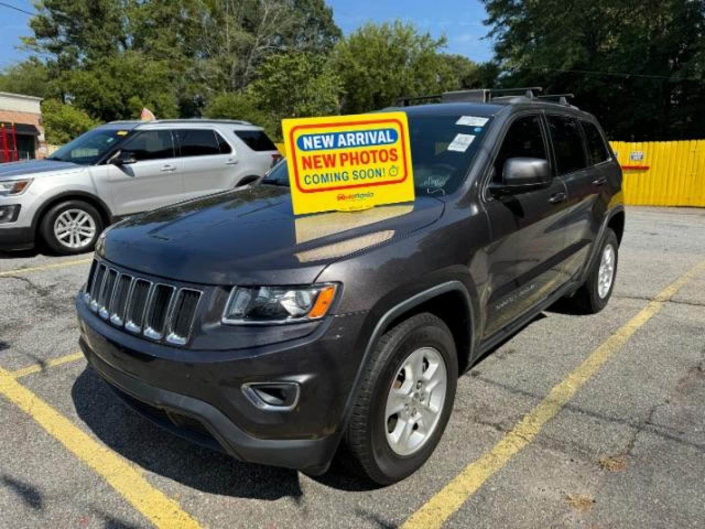 2015 Gray Jeep Grand Cherokee Laredo 2WD (1C4RJEAG7FC) with an 3.6L V6 DOHC 24V engine, 8-Speed Automatic transmission, located at 1806 Veterans Memorial Hwy SW, Austell, GA, 30168, (770) 944-9558, 33.817959, -84.606987 - Photo#0