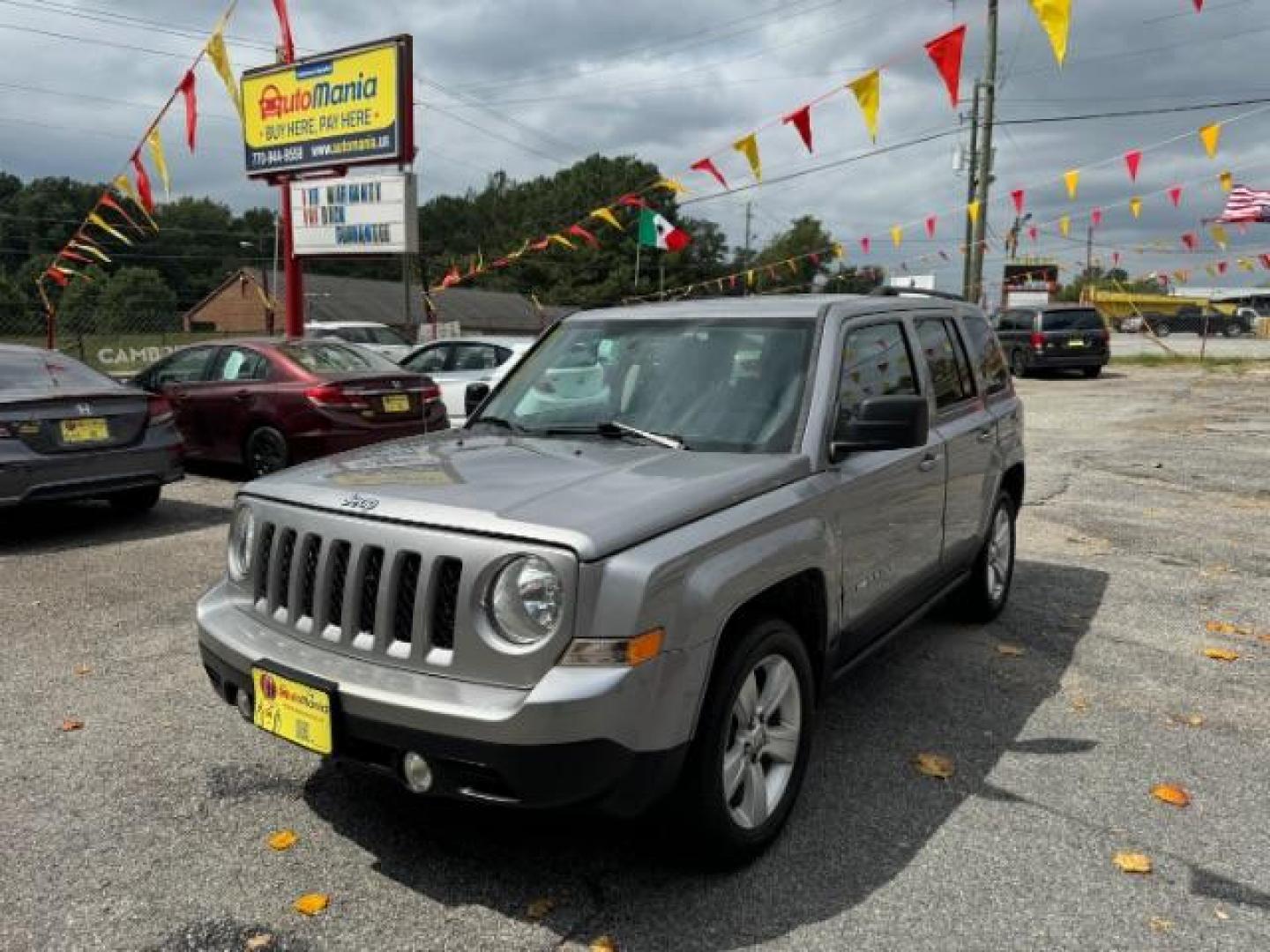 2017 Silver Jeep Patriot Latitude 2WD (1C4NJPFA8HD) with an 2.0L L4 DOHC 16V engine, Continuously Variable Transmission transmission, located at 1806 Veterans Memorial Hwy SW, Austell, GA, 30168, (770) 944-9558, 33.817959, -84.606987 - Photo#0