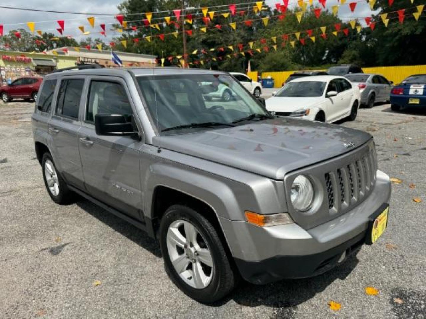 2017 Silver Jeep Patriot Latitude 2WD (1C4NJPFA8HD) with an 2.0L L4 DOHC 16V engine, Continuously Variable Transmission transmission, located at 1806 Veterans Memorial Hwy SW, Austell, GA, 30168, (770) 944-9558, 33.817959, -84.606987 - Photo#2