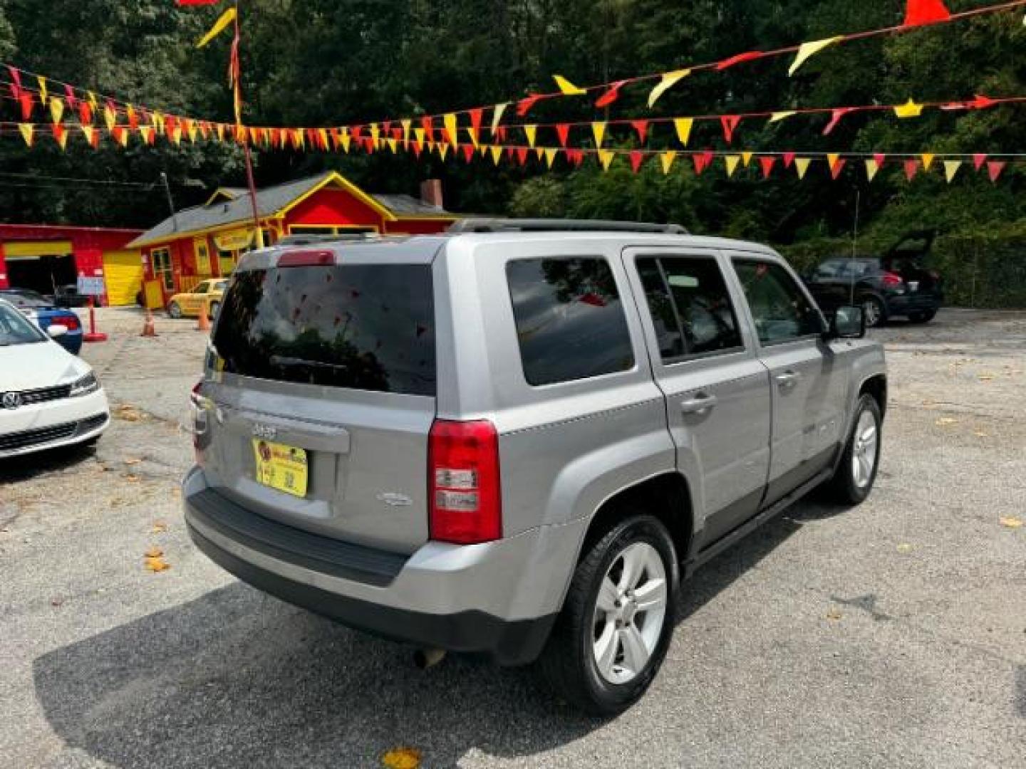 2017 Silver Jeep Patriot Latitude 2WD (1C4NJPFA8HD) with an 2.0L L4 DOHC 16V engine, Continuously Variable Transmission transmission, located at 1806 Veterans Memorial Hwy SW, Austell, GA, 30168, (770) 944-9558, 33.817959, -84.606987 - Photo#3