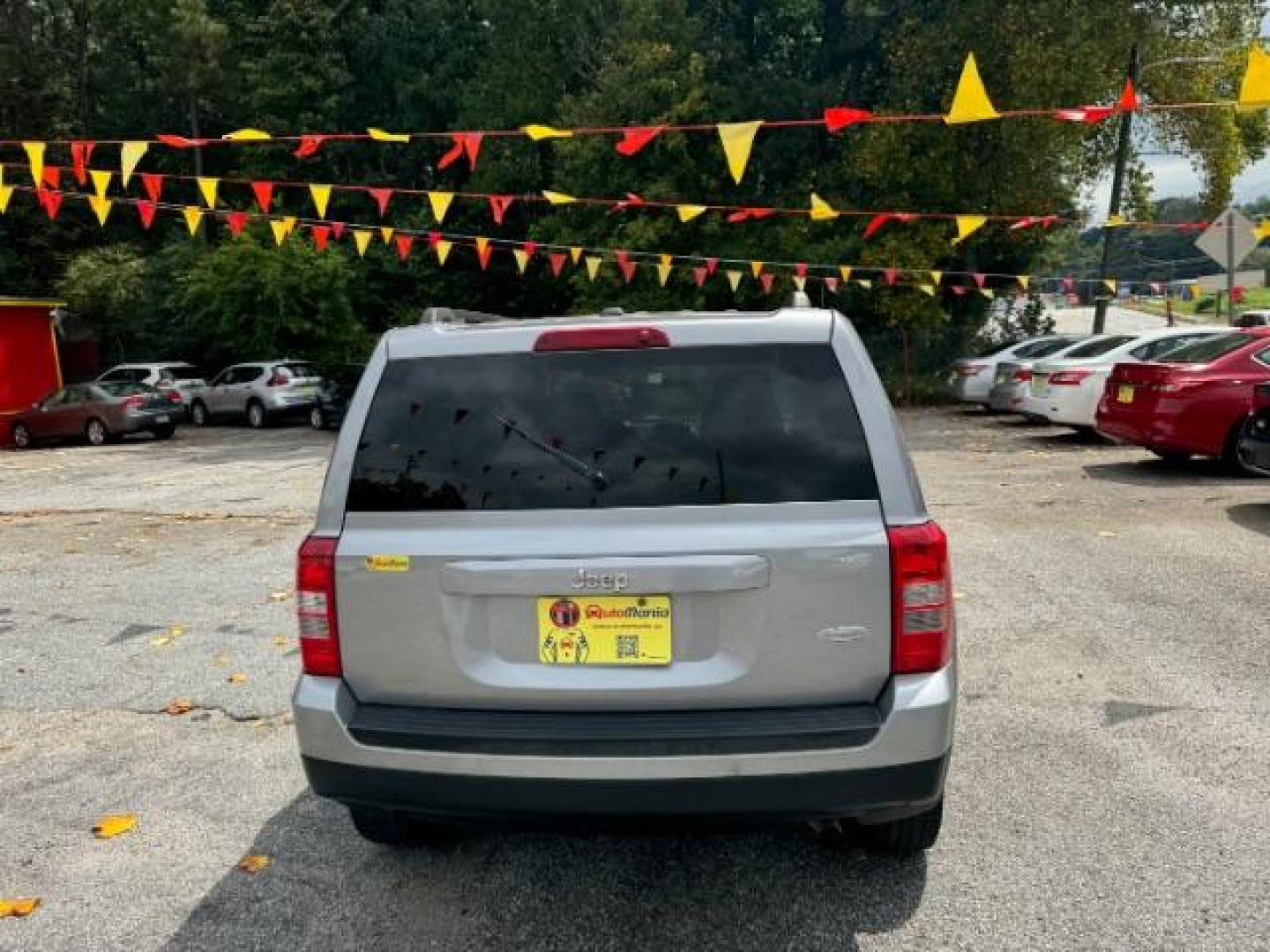 2017 Silver Jeep Patriot Latitude 2WD (1C4NJPFA8HD) with an 2.0L L4 DOHC 16V engine, Continuously Variable Transmission transmission, located at 1806 Veterans Memorial Hwy SW, Austell, GA, 30168, (770) 944-9558, 33.817959, -84.606987 - Photo#4