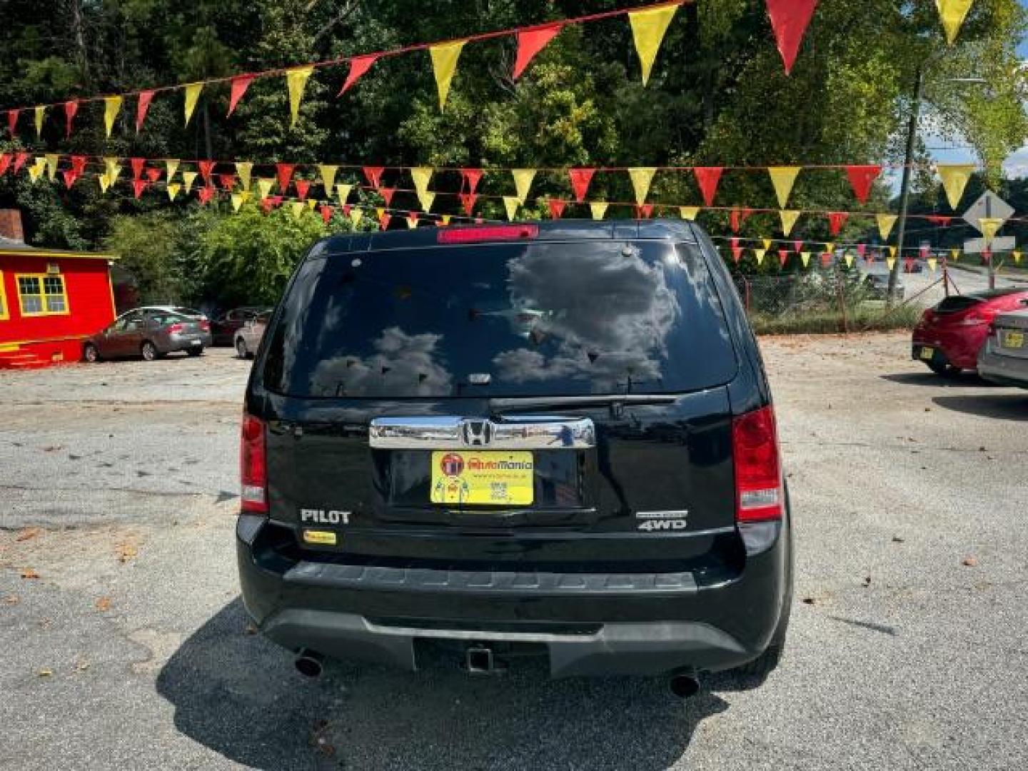 2015 Black Honda Pilot SE 4WD (5FNYF4H32FB) with an 3.5L V6 SOHC 24V engine, 5-Speed Automatic transmission, located at 1806 Veterans Memorial Hwy SW, Austell, GA, 30168, (770) 944-9558, 33.817959, -84.606987 - Photo#3