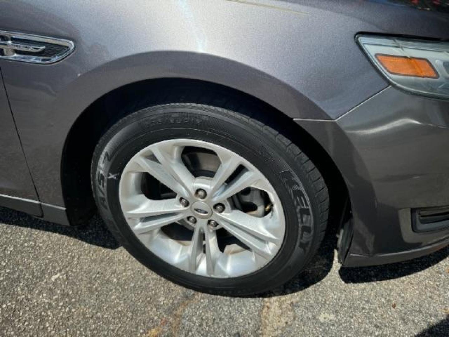 2013 Gray Ford Taurus SEL FWD (1FAHP2E8XDG) with an 3.5L V6 DOHC 24V engine, 6-Speed Automatic transmission, located at 1806 Veterans Memorial Hwy SW, Austell, GA, 30168, (770) 944-9558, 33.817959, -84.606987 - Photo#19