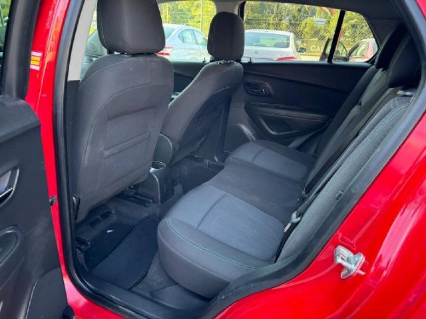 2015 Red Chevrolet Trax LT FWD (KL7CJLSBXFB) with an 1.4L L4 DOHC 16V engine, 6-Speed Automatic transmission, located at 1806 Veterans Memorial Hwy SW, Austell, GA, 30168, (770) 944-9558, 33.817959, -84.606987 - Photo#10