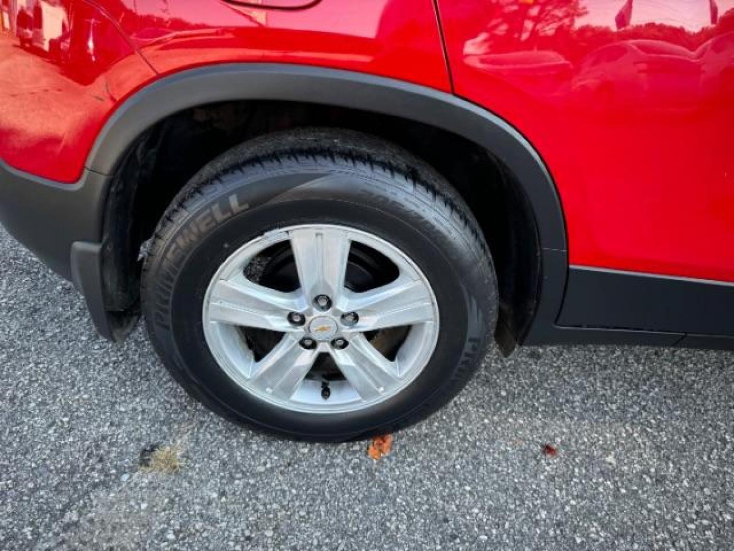 2015 Red Chevrolet Trax LT FWD (KL7CJLSBXFB) with an 1.4L L4 DOHC 16V engine, 6-Speed Automatic transmission, located at 1806 Veterans Memorial Hwy SW, Austell, GA, 30168, (770) 944-9558, 33.817959, -84.606987 - Photo#22