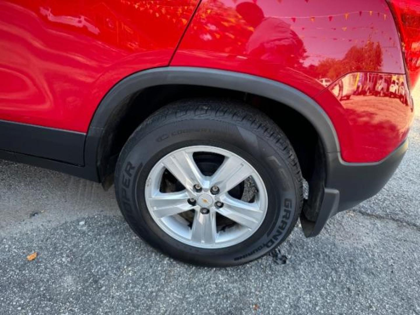 2015 Red Chevrolet Trax LT FWD (KL7CJLSBXFB) with an 1.4L L4 DOHC 16V engine, 6-Speed Automatic transmission, located at 1806 Veterans Memorial Hwy SW, Austell, GA, 30168, (770) 944-9558, 33.817959, -84.606987 - Photo#23