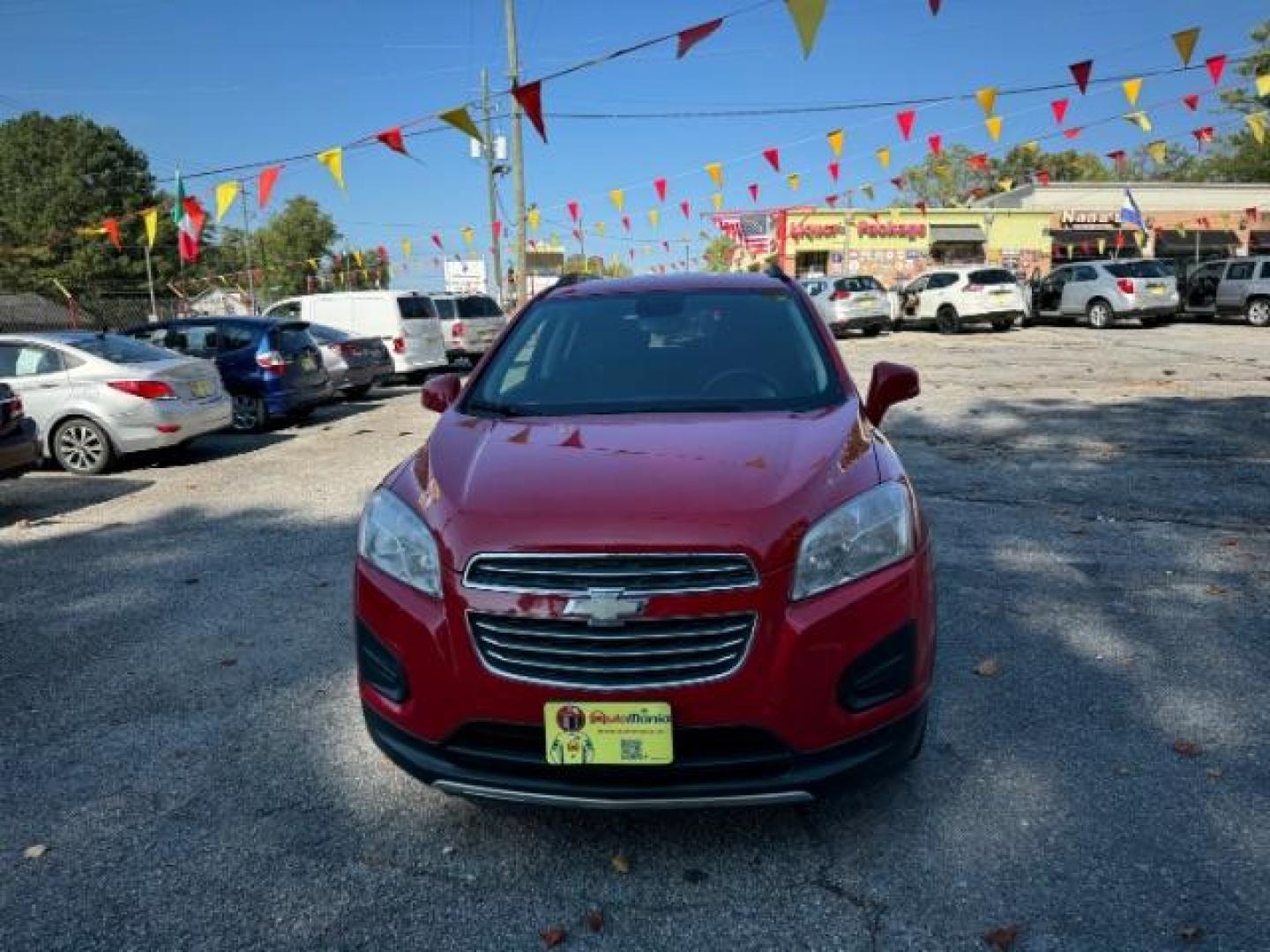 2015 Red Chevrolet Trax LT FWD (KL7CJLSBXFB) with an 1.4L L4 DOHC 16V engine, 6-Speed Automatic transmission, located at 1806 Veterans Memorial Hwy SW, Austell, GA, 30168, (770) 944-9558, 33.817959, -84.606987 - Photo#1