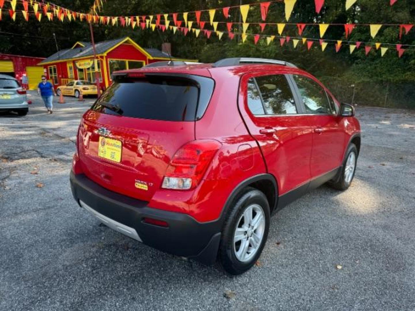 2015 Red Chevrolet Trax LT FWD (KL7CJLSBXFB) with an 1.4L L4 DOHC 16V engine, 6-Speed Automatic transmission, located at 1806 Veterans Memorial Hwy SW, Austell, GA, 30168, (770) 944-9558, 33.817959, -84.606987 - Photo#3