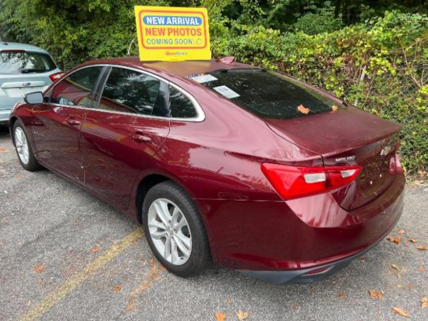 2016 Red Chevrolet Malibu 1LT (1G1ZE5ST5GF) with an 1.5L L4 DOHC 16V engine, 6-Speed Automatic transmission, located at 1806 Veterans Memorial Hwy SW, Austell, GA, 30168, (770) 944-9558, 33.817959, -84.606987 - Photo#0