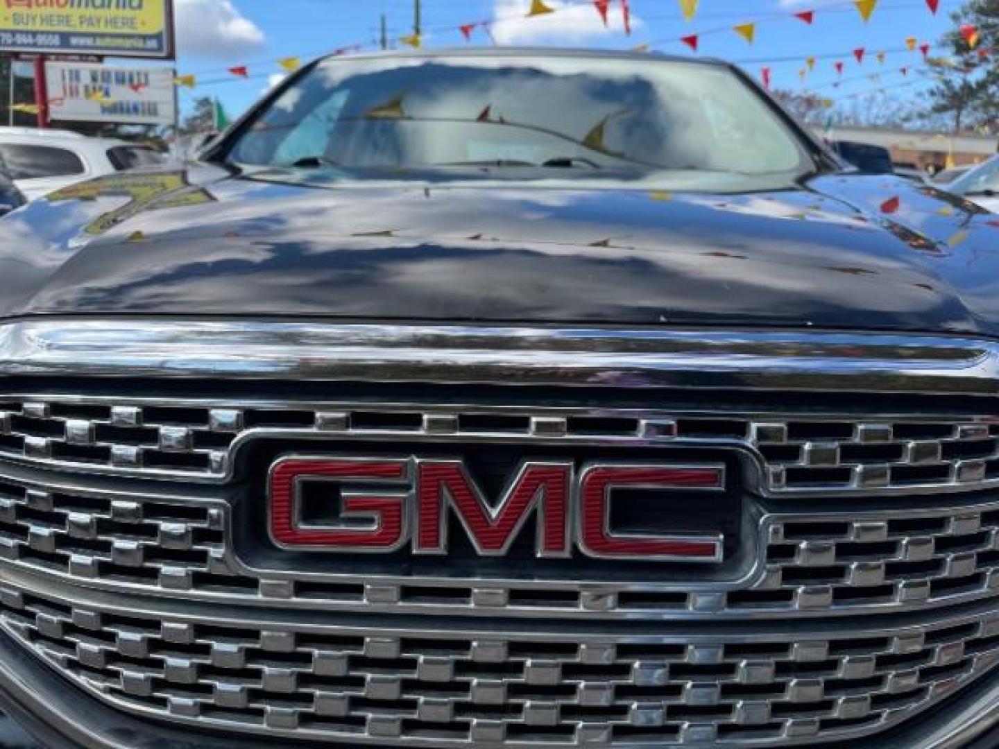 2017 Black GMC Acadia Denali AWD (1GKKNXLS4HZ) with an 3.6L V6 DOHC 24V engine, 6-Speed Automatic transmission, located at 1806 Veterans Memorial Hwy SW, Austell, GA, 30168, (770) 944-9558, 33.817959, -84.606987 - Photo#23