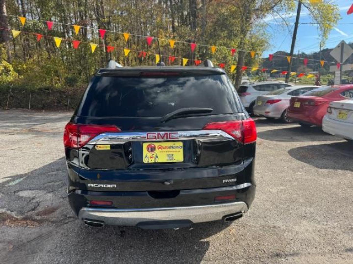 2017 Black GMC Acadia Denali AWD (1GKKNXLS4HZ) with an 3.6L V6 DOHC 24V engine, 6-Speed Automatic transmission, located at 1806 Veterans Memorial Hwy SW, Austell, GA, 30168, (770) 944-9558, 33.817959, -84.606987 - Photo#3