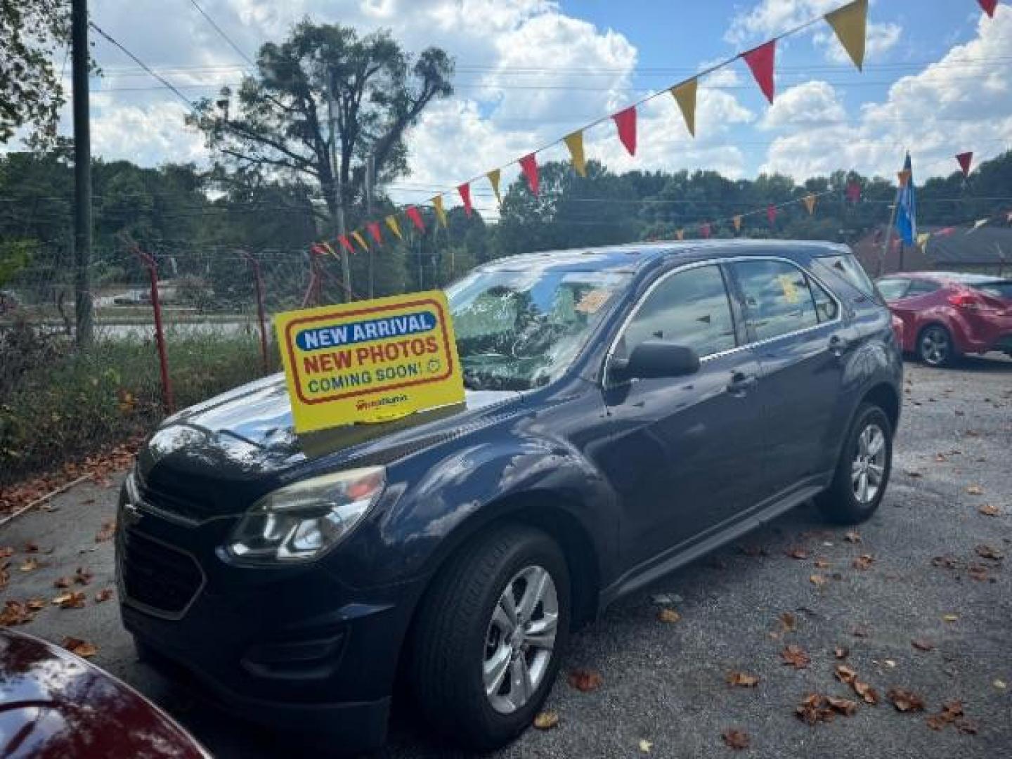 2017 Blue Chevrolet Equinox LS 2WD (2GNALBEK1H1) with an 2.4L L4 DOHC 16V FFV engine, 6-Speed Automatic transmission, located at 1806 Veterans Memorial Hwy SW, Austell, GA, 30168, (770) 944-9558, 33.817959, -84.606987 - Photo#0