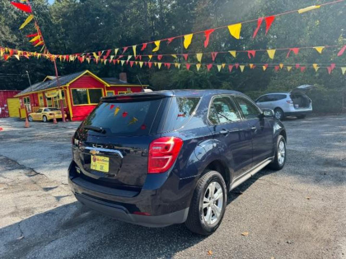 2017 Blue Chevrolet Equinox LS 2WD (2GNALBEK1H1) with an 2.4L L4 DOHC 16V FFV engine, 6-Speed Automatic transmission, located at 1806 Veterans Memorial Hwy SW, Austell, GA, 30168, (770) 944-9558, 33.817959, -84.606987 - Photo#1