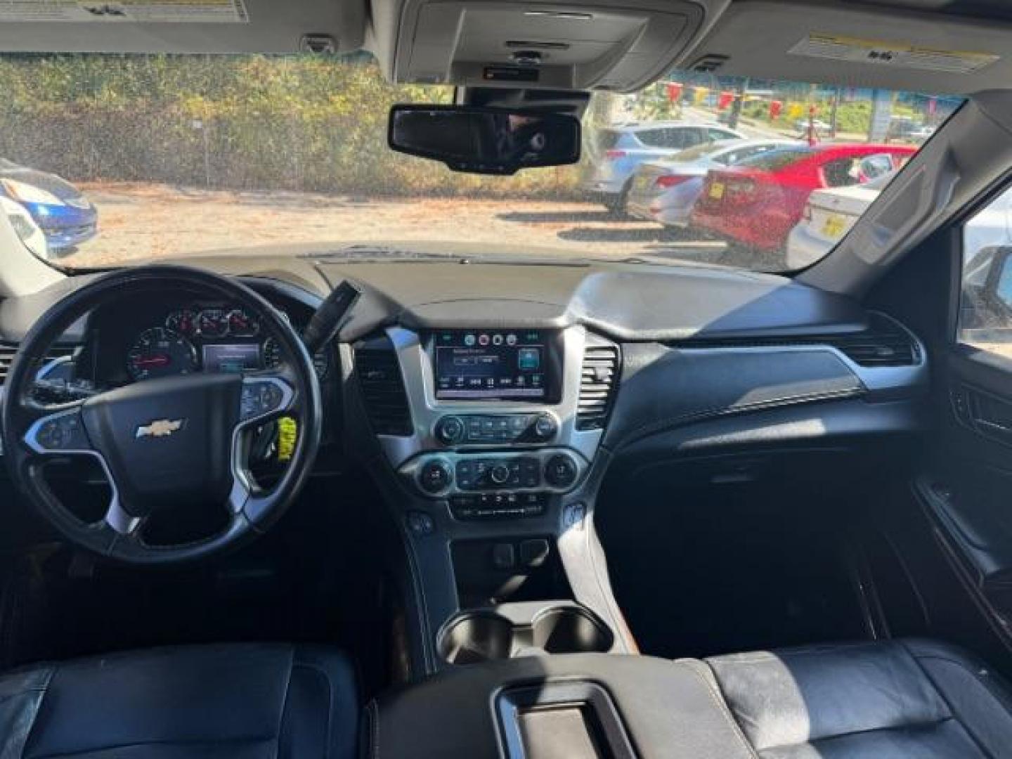 2016 Black Chevrolet Tahoe LT 4WD (1GNSKBKC9GR) with an 5.3L V8 OHV 16V engine, 6-Speed Automatic transmission, located at 1806 Veterans Memorial Hwy SW, Austell, GA, 30168, (770) 944-9558, 33.817959, -84.606987 - Photo#11