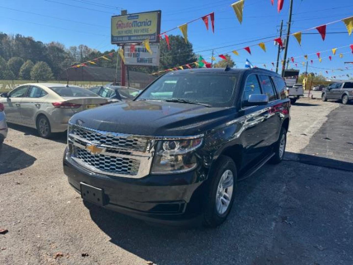 2016 Black Chevrolet Tahoe LT 4WD (1GNSKBKC9GR) with an 5.3L V8 OHV 16V engine, 6-Speed Automatic transmission, located at 1806 Veterans Memorial Hwy SW, Austell, GA, 30168, (770) 944-9558, 33.817959, -84.606987 - Photo#0