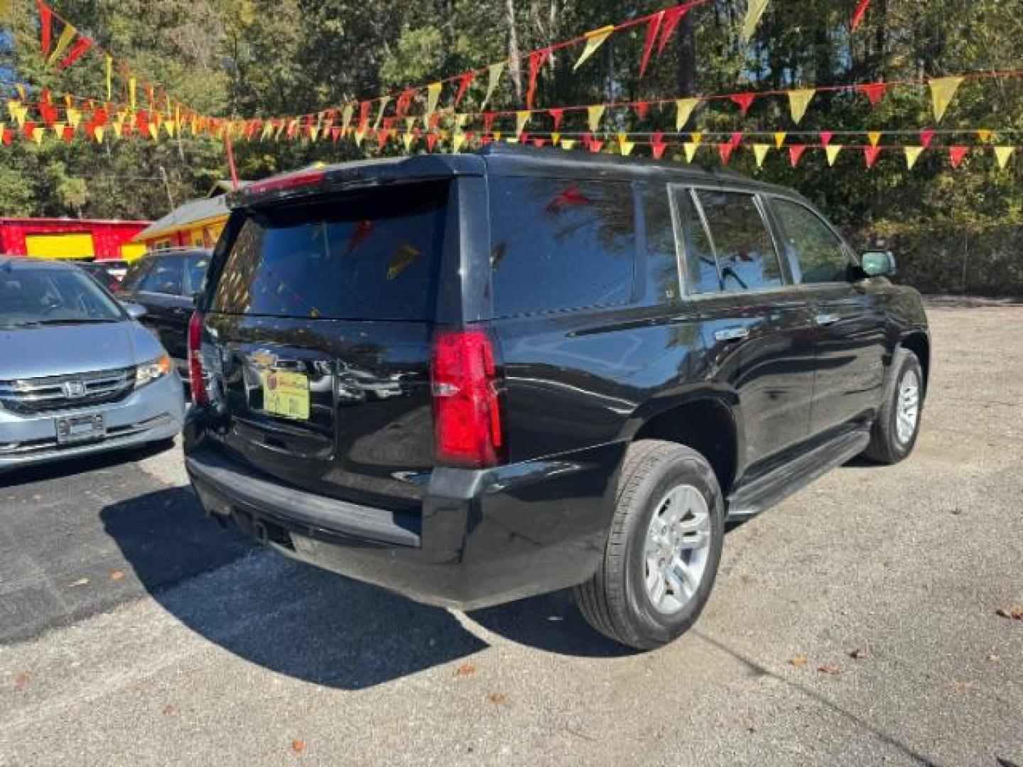 2016 Black Chevrolet Tahoe LT 4WD (1GNSKBKC9GR) with an 5.3L V8 OHV 16V engine, 6-Speed Automatic transmission, located at 1806 Veterans Memorial Hwy SW, Austell, GA, 30168, (770) 944-9558, 33.817959, -84.606987 - Photo#3