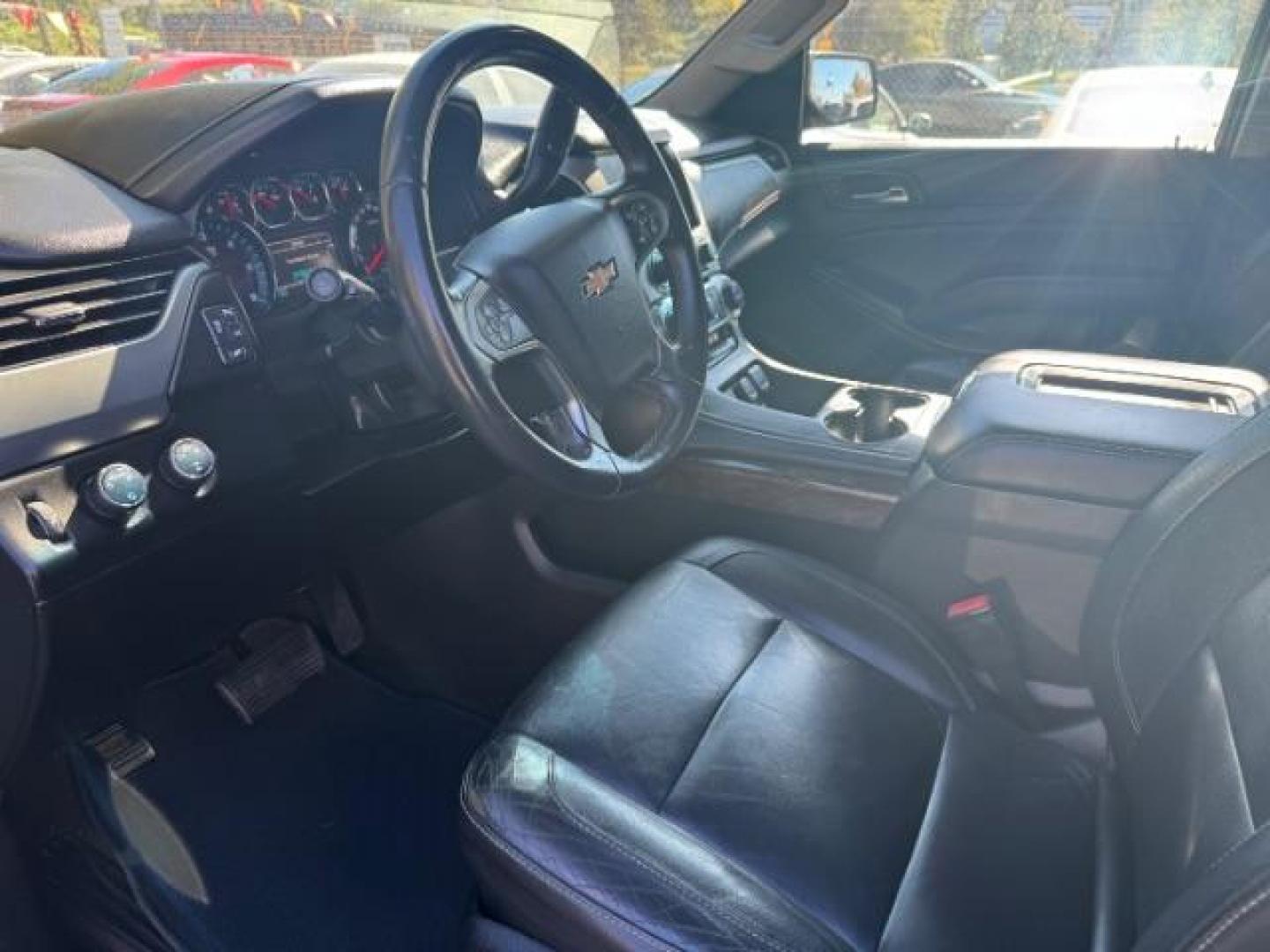 2016 Black Chevrolet Tahoe LT 4WD (1GNSKBKC9GR) with an 5.3L V8 OHV 16V engine, 6-Speed Automatic transmission, located at 1806 Veterans Memorial Hwy SW, Austell, GA, 30168, (770) 944-9558, 33.817959, -84.606987 - Photo#6