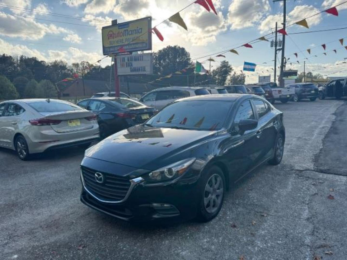 2017 Black Mazda MAZDA3 i Sport AT 4-Door (3MZBN1U75HM) with an 2.0L L4 DOHC 16V engine, 6-Speed Automatic transmission, located at 1806 Veterans Memorial Hwy SW, Austell, GA, 30168, (770) 944-9558, 33.817959, -84.606987 - Photo#0