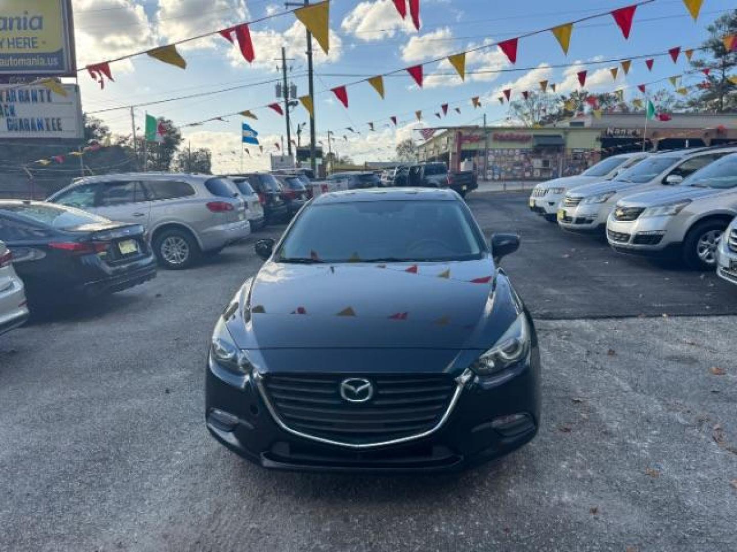 2017 Black Mazda MAZDA3 i Sport AT 4-Door (3MZBN1U75HM) with an 2.0L L4 DOHC 16V engine, 6-Speed Automatic transmission, located at 1806 Veterans Memorial Hwy SW, Austell, GA, 30168, (770) 944-9558, 33.817959, -84.606987 - Photo#1