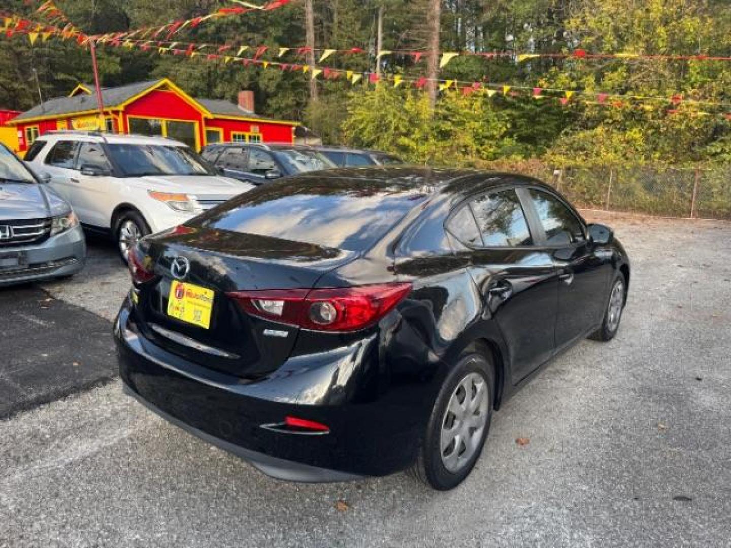 2017 Black Mazda MAZDA3 i Sport AT 4-Door (3MZBN1U75HM) with an 2.0L L4 DOHC 16V engine, 6-Speed Automatic transmission, located at 1806 Veterans Memorial Hwy SW, Austell, GA, 30168, (770) 944-9558, 33.817959, -84.606987 - Photo#3