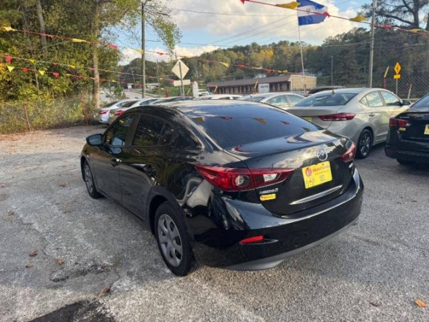 2017 Black Mazda MAZDA3 i Sport AT 4-Door (3MZBN1U75HM) with an 2.0L L4 DOHC 16V engine, 6-Speed Automatic transmission, located at 1806 Veterans Memorial Hwy SW, Austell, GA, 30168, (770) 944-9558, 33.817959, -84.606987 - Photo#5