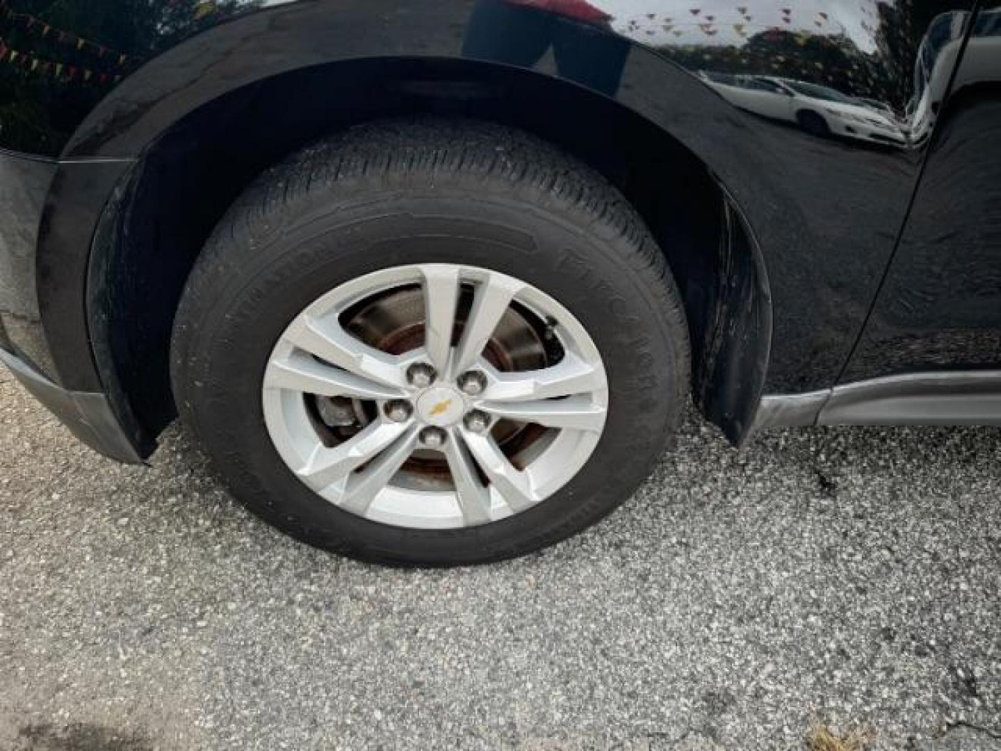 2013 Black Chevrolet Equinox LS 2WD (2GNALBEK6D1) with an 2.4L L4 DOHC 16V engine, 6-Speed Automatic transmission, located at 1806 Veterans Memorial Hwy SW, Austell, GA, 30168, (770) 944-9558, 33.817959, -84.606987 - Photo#15