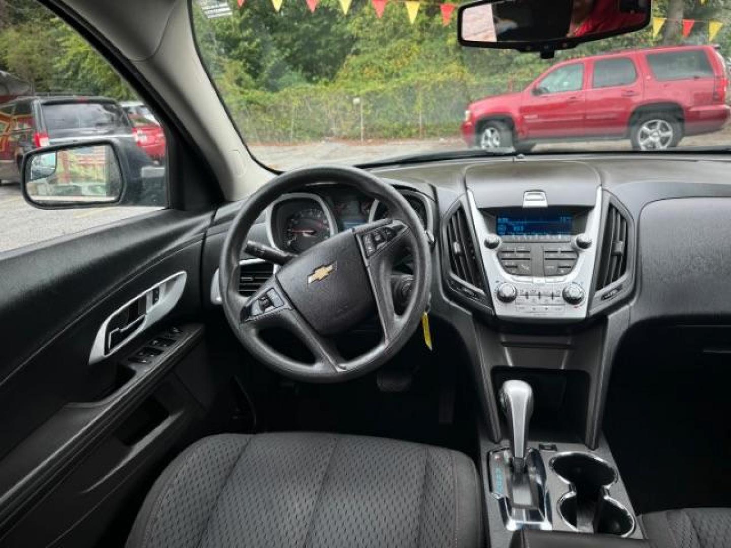 2013 Black Chevrolet Equinox LS 2WD (2GNALBEK6D1) with an 2.4L L4 DOHC 16V engine, 6-Speed Automatic transmission, located at 1806 Veterans Memorial Hwy SW, Austell, GA, 30168, (770) 944-9558, 33.817959, -84.606987 - Photo#18