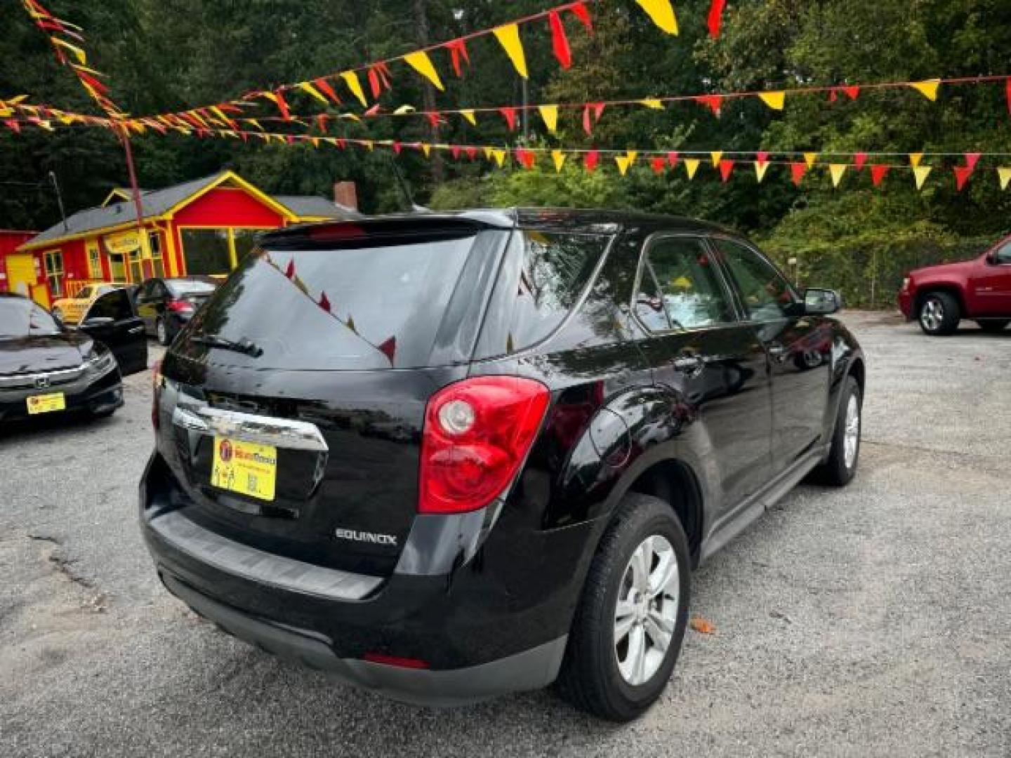 2013 Black Chevrolet Equinox LS 2WD (2GNALBEK6D1) with an 2.4L L4 DOHC 16V engine, 6-Speed Automatic transmission, located at 1806 Veterans Memorial Hwy SW, Austell, GA, 30168, (770) 944-9558, 33.817959, -84.606987 - Photo#1