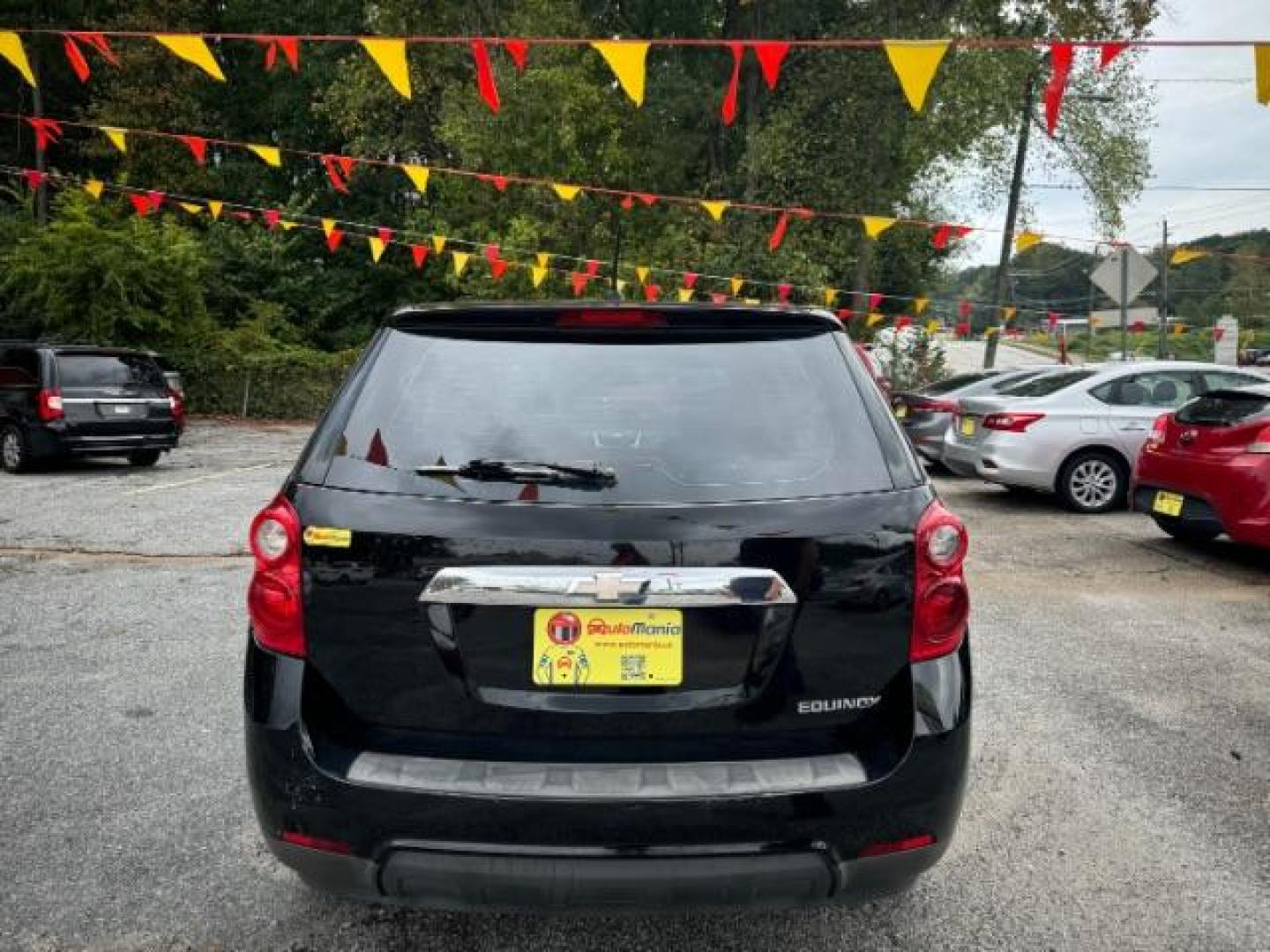 2013 Black Chevrolet Equinox LS 2WD (2GNALBEK6D1) with an 2.4L L4 DOHC 16V engine, 6-Speed Automatic transmission, located at 1806 Veterans Memorial Hwy SW, Austell, GA, 30168, (770) 944-9558, 33.817959, -84.606987 - Photo#2